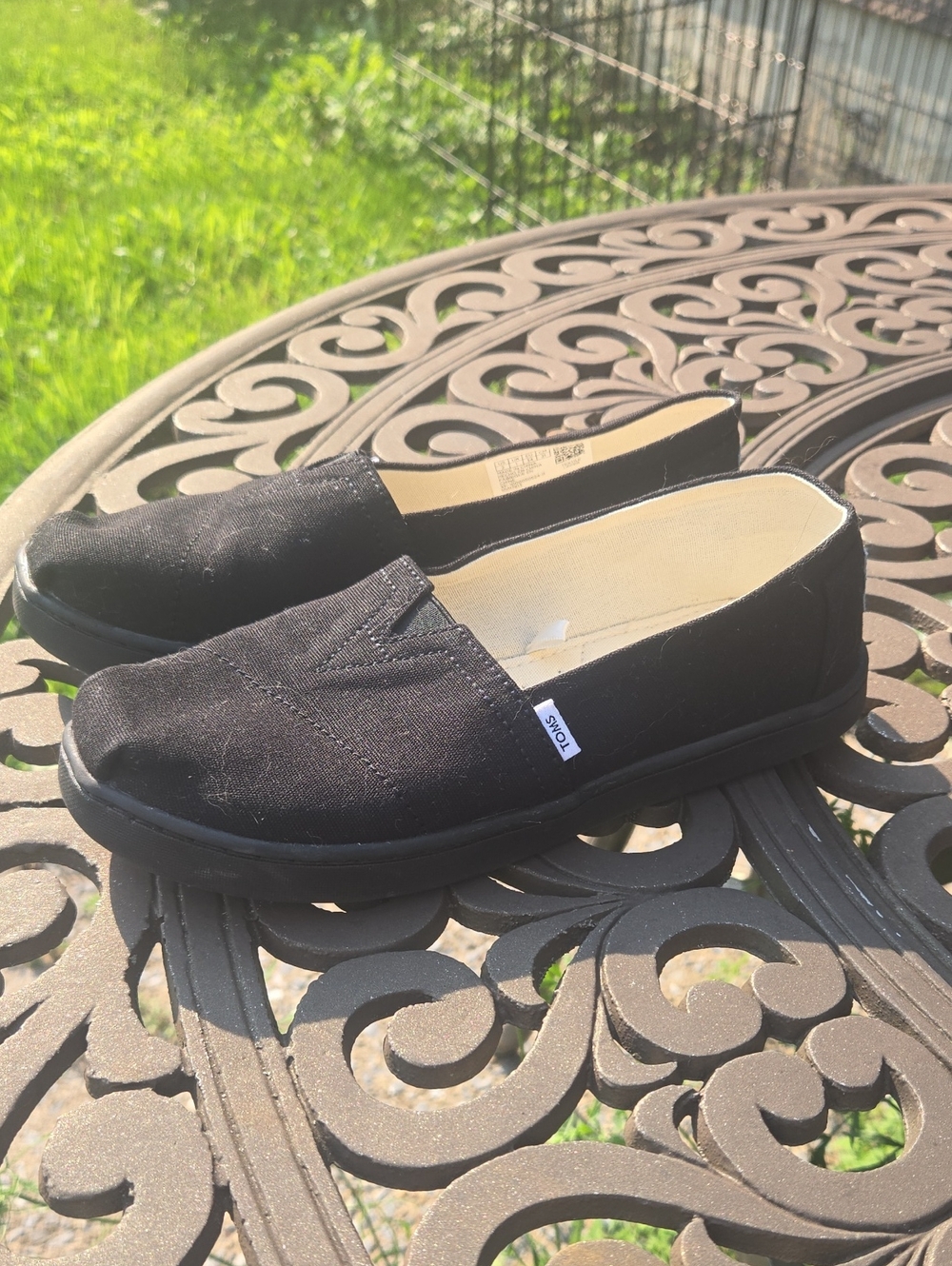 TOMS Women's Black Canvas Slip-On Moccasins